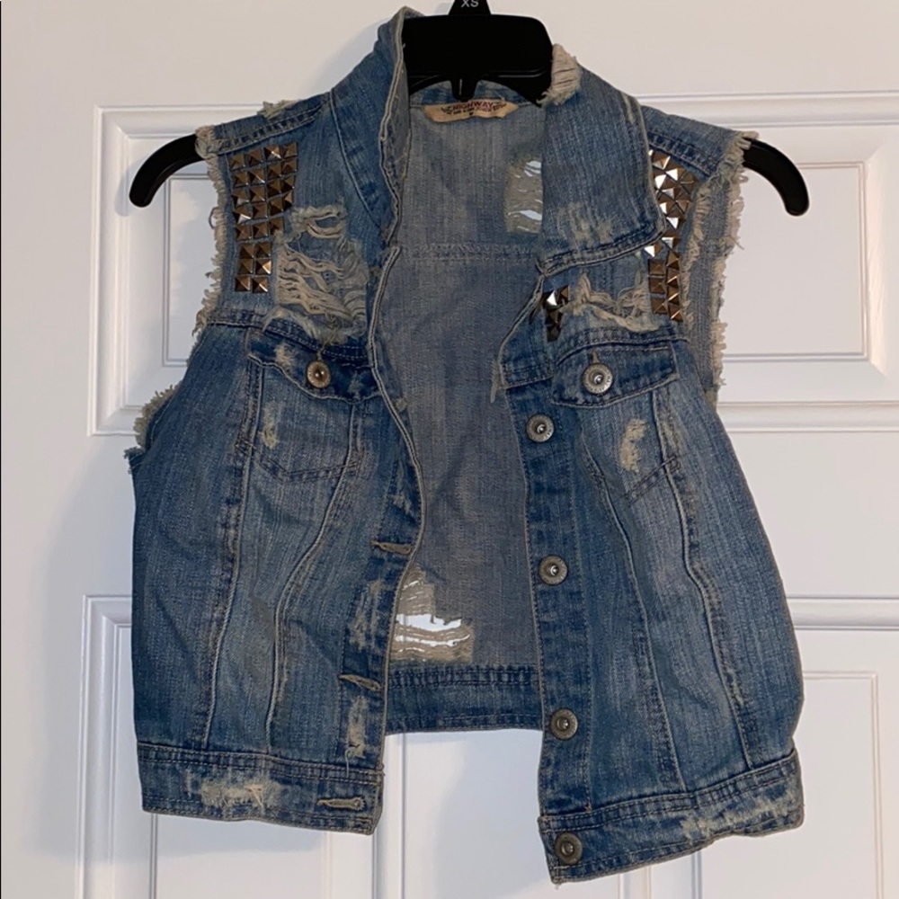 Distressed denim vest